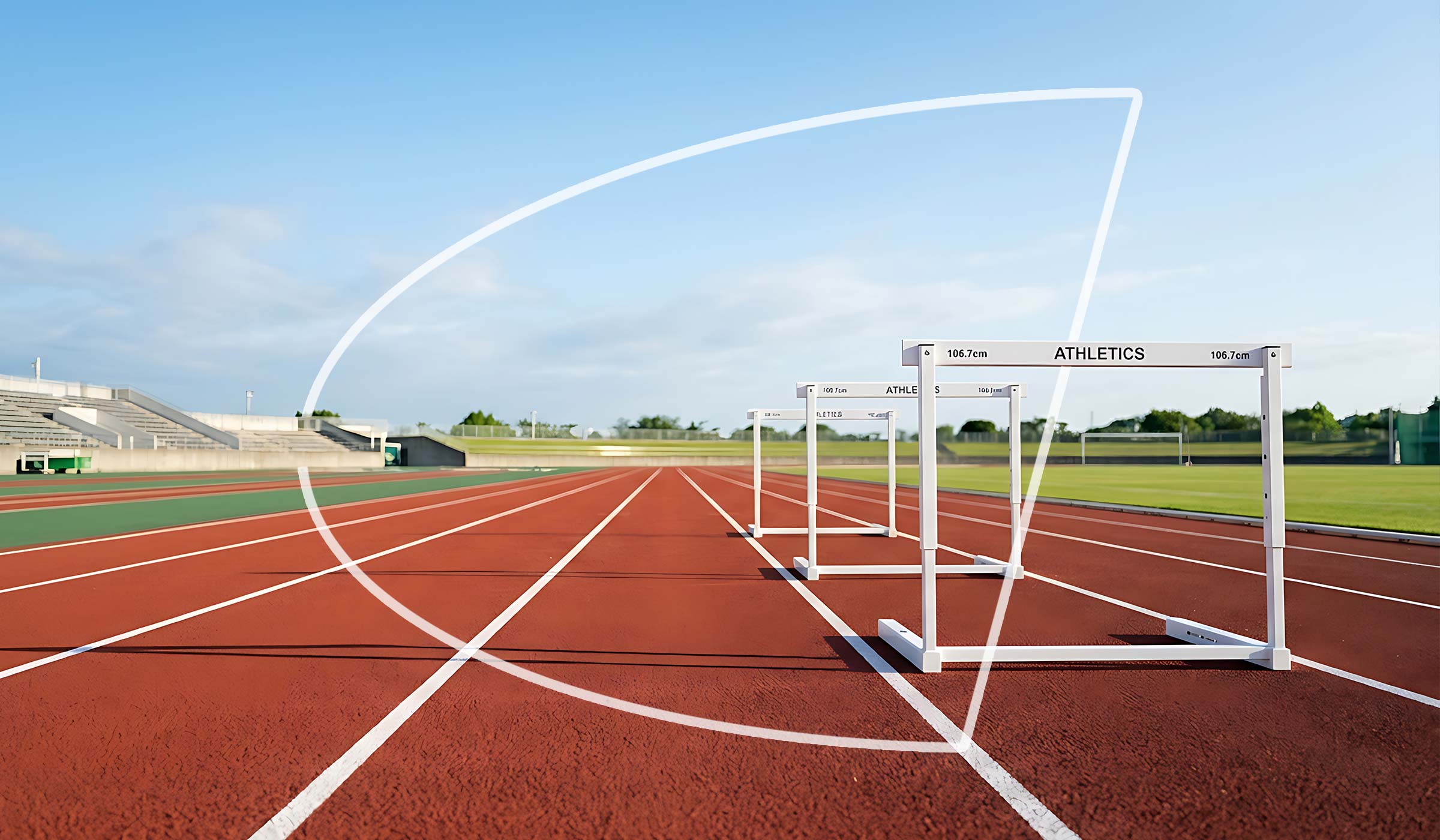 Haies sur une piste d’athlétisme rouge dans un stade en plein air